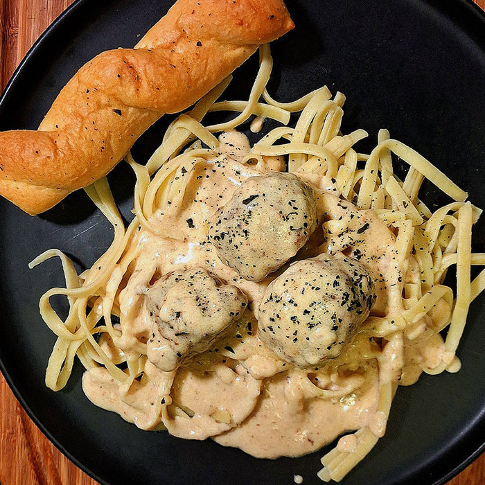 Creamy Garlic Parmesan Chicken Meatballs (Feathered Feast Version)